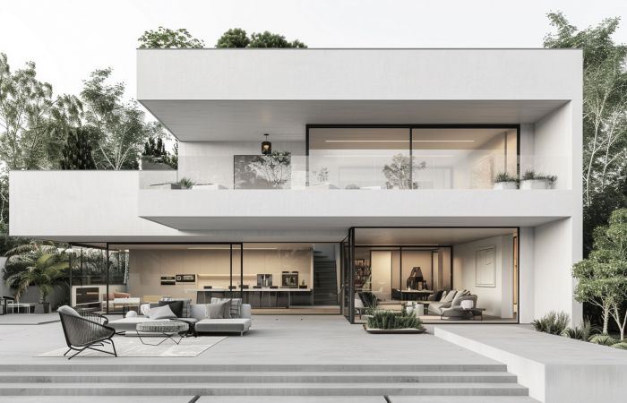 modernes weißes Einfamilienhaus mi großzügiger Terrasse und Balkon