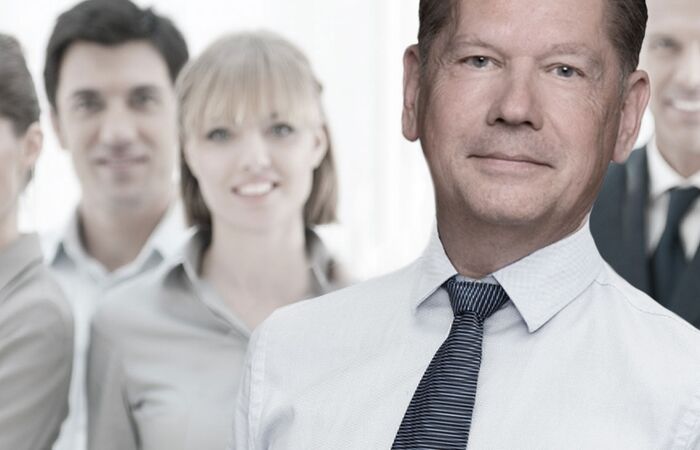 Teambild mit dem Geschäftsführer von WSD Sicherheitsdienst Ingo Lütke im Vordergrund